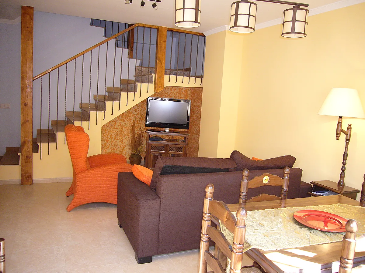 Salón con escalera de La Besana